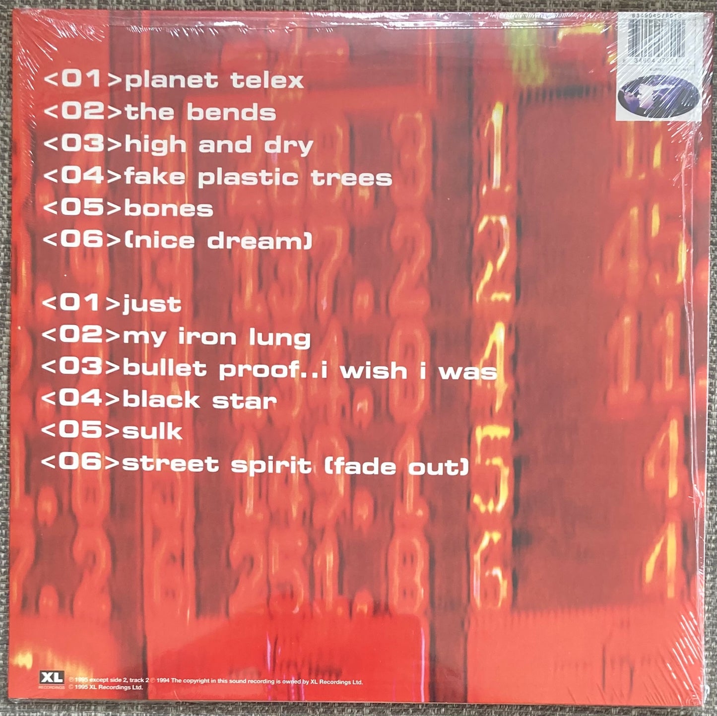 The back of 'Radiohead - The Bends' on vinyl. It is brand new and sealed.