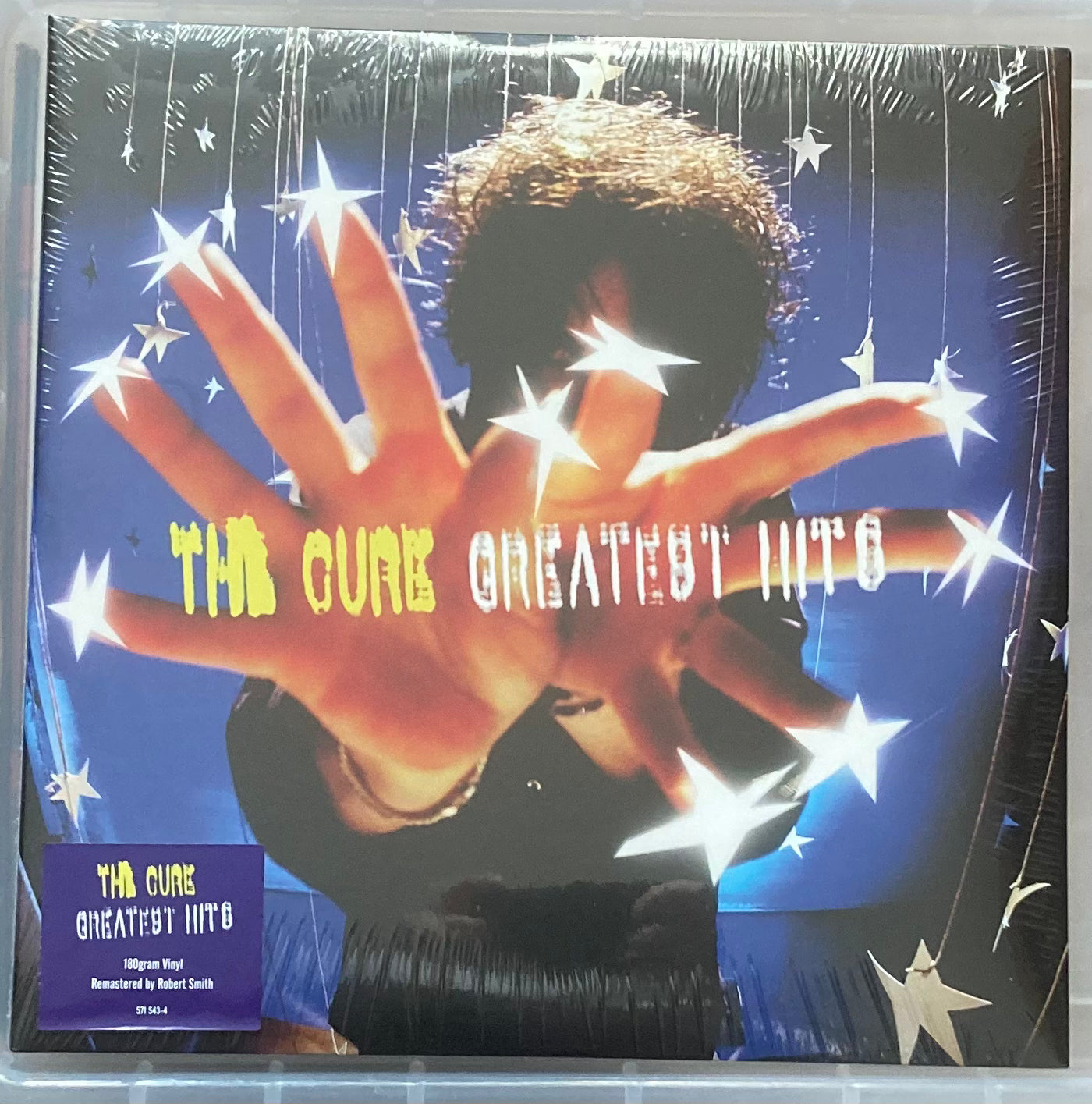 The front of the Cure's Greatest Hits on vinyl