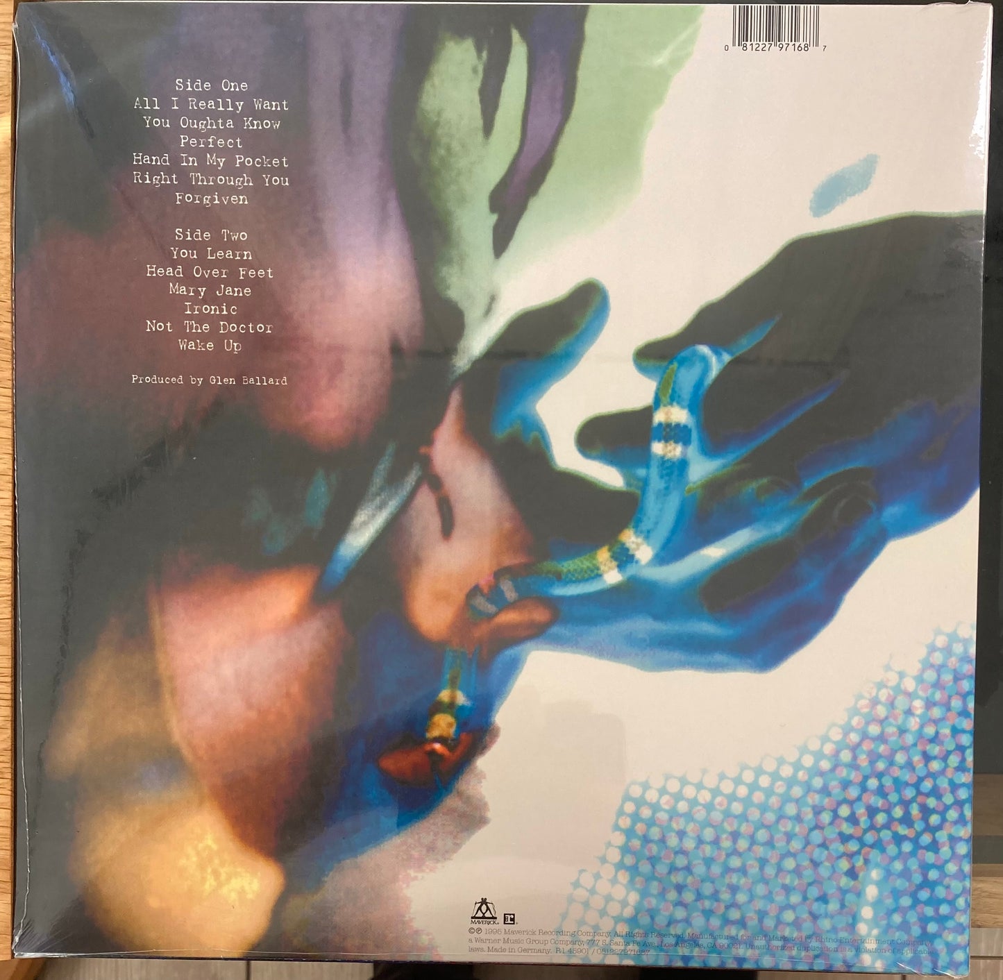 The back of 'Alanis Morissette Jagged Little Pill' on vinyl