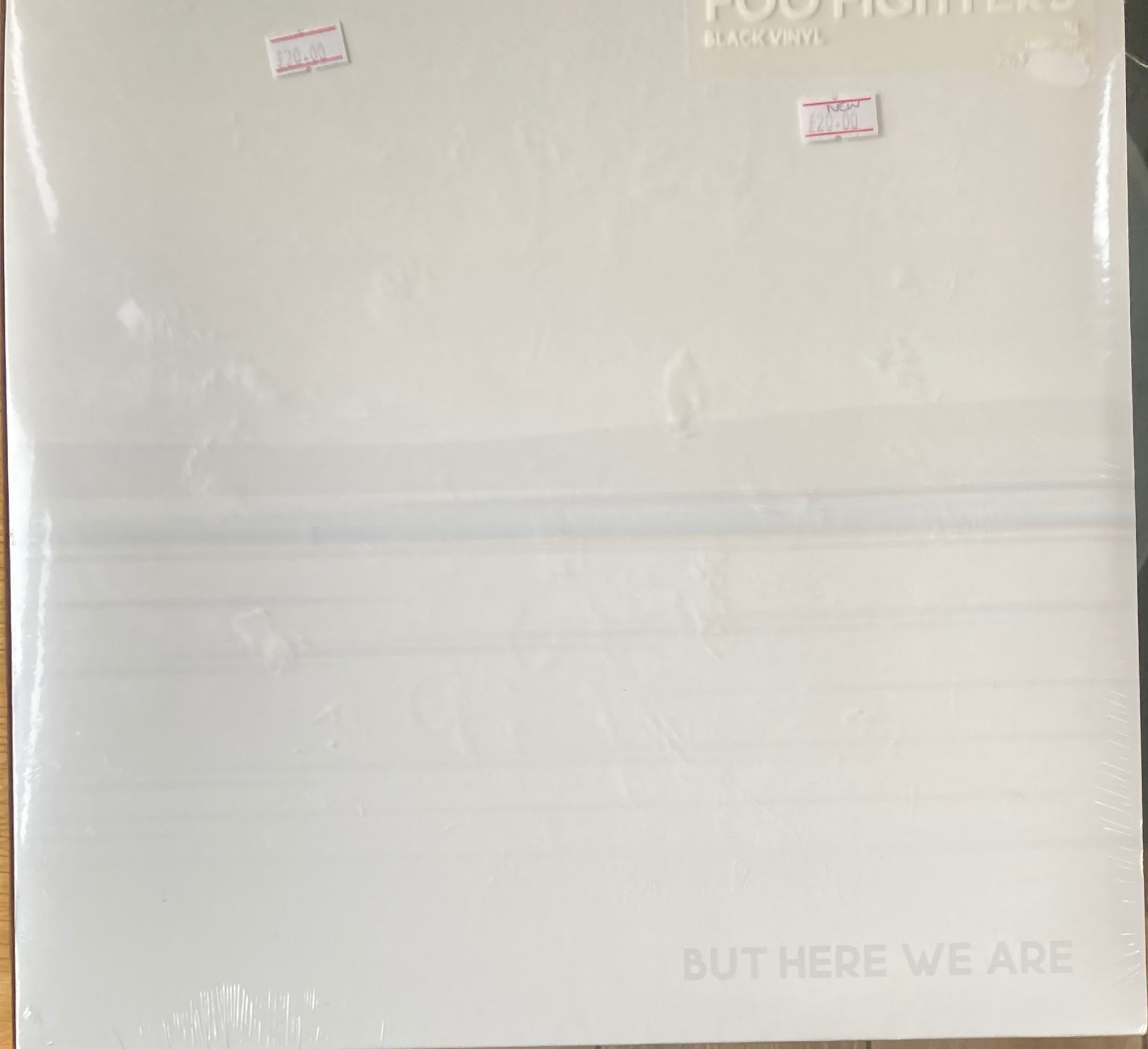 The front of 'Foo Fighters ...But Here We Are' on vinyl