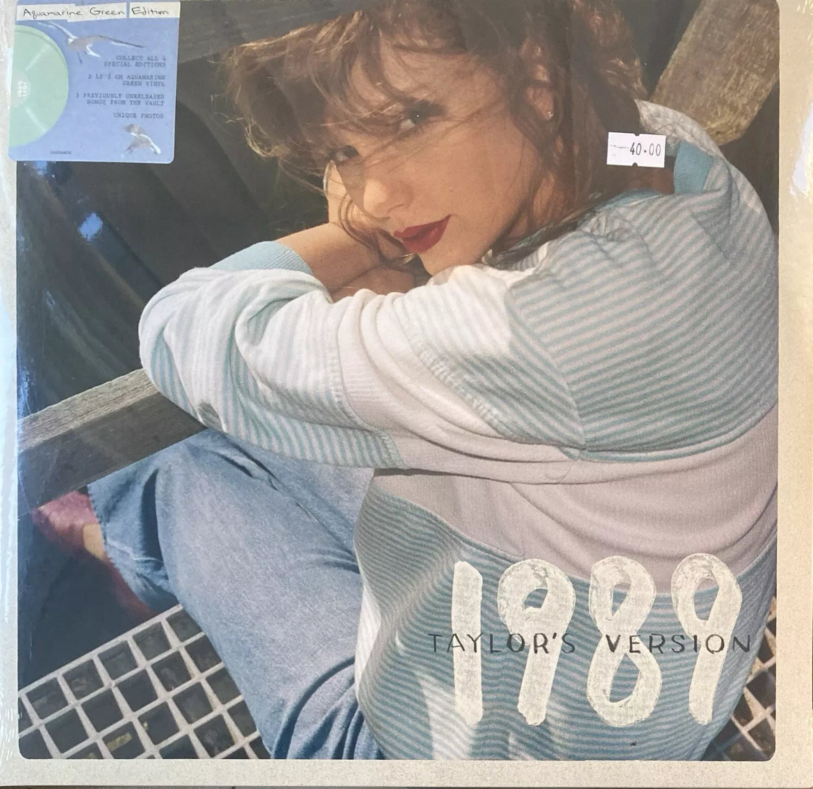 The front of 'Taylor Swift 1989 Taylor’s Version (Aquamarine Green)' on vinyl