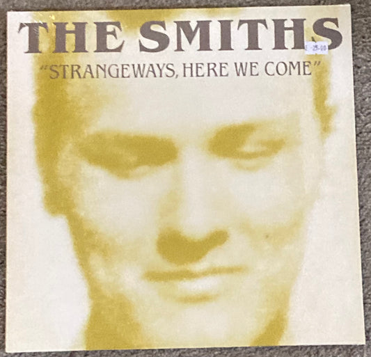 The front of 'The Smiths - Strangeways, Here We Come' on vinyl
