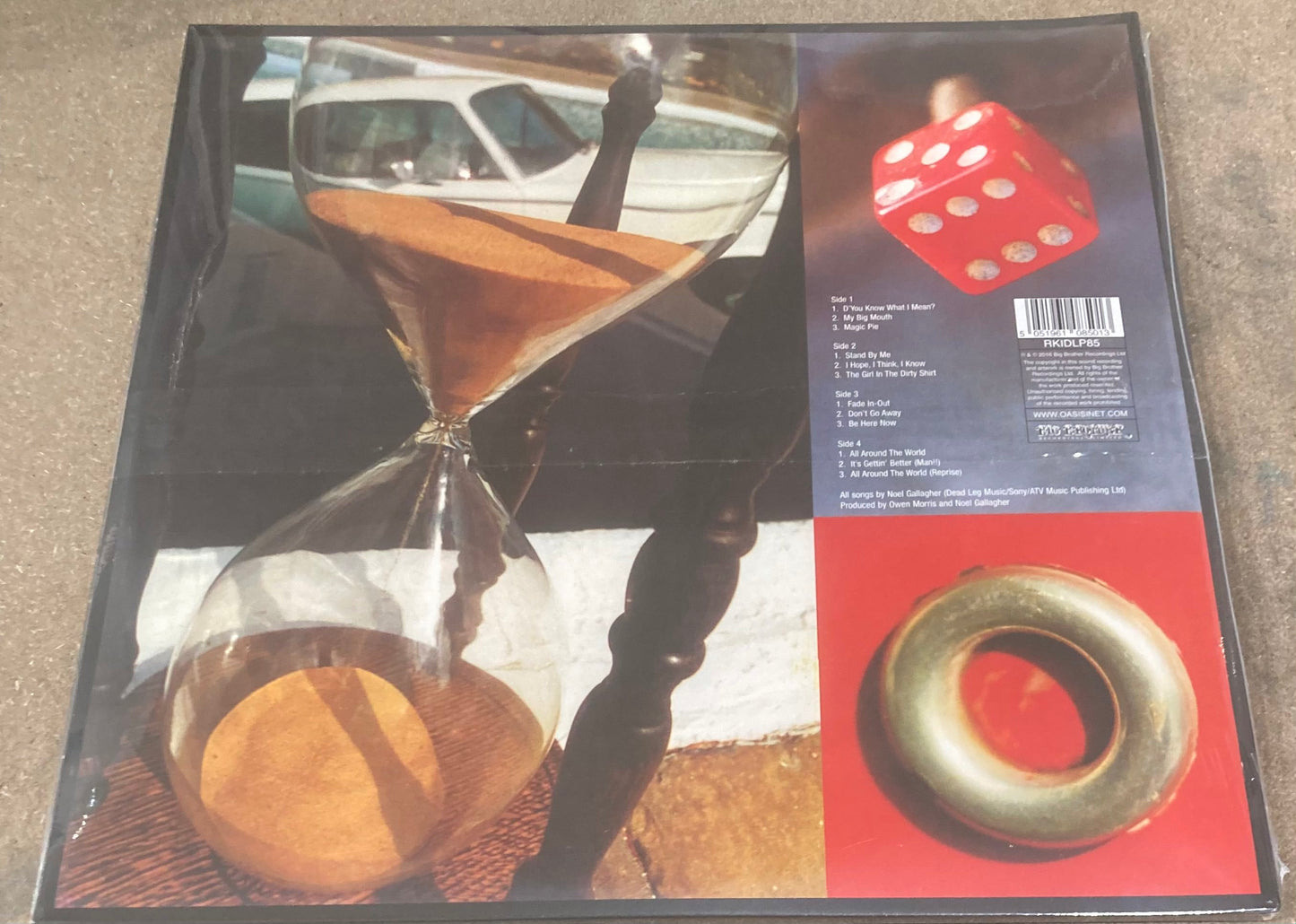 The back of ‘Oasis - Be Here Now’ on vinyl