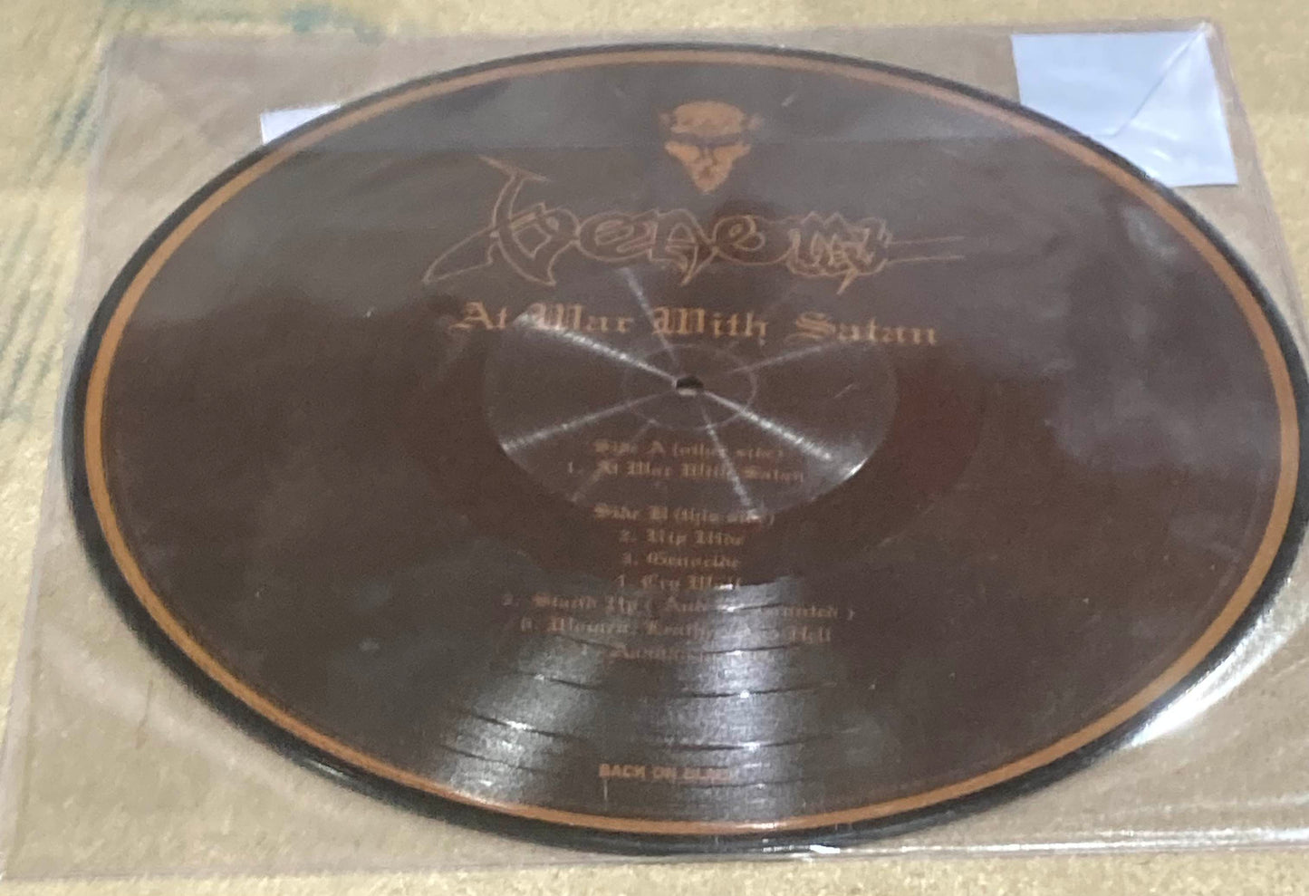 The back of Venom - At War With Satan on vinyl.