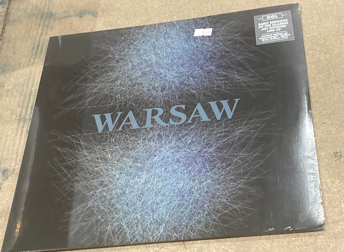 The front of Warsaw’s self-titled album on vinyl.