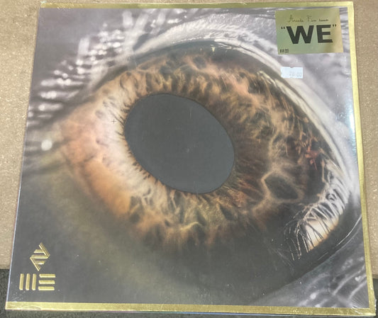 The front of 'Arcade Fire - We' on vinyl
