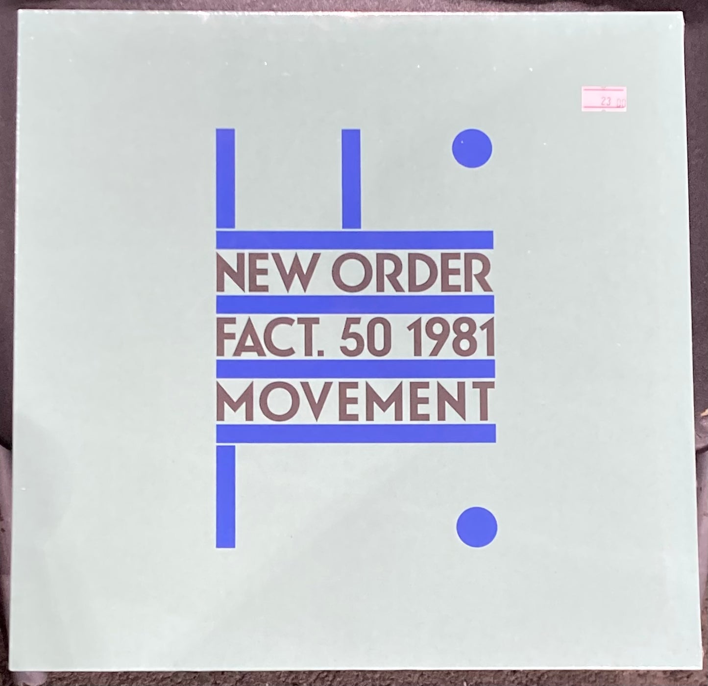 The front of 'New Order - Movement' on vinyl