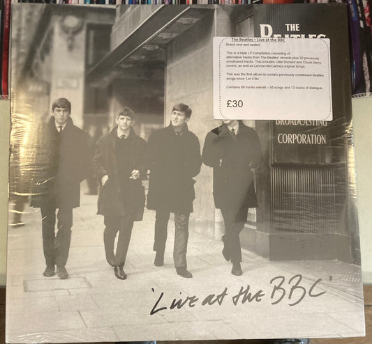 The front of 'The Beatles - Live at the BBC' on vinyl. It is brand new and sealed, with an additional description on the packaging