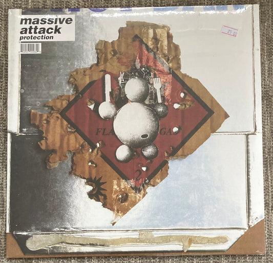The front of 'Massive Attack - Protection' on vinyl. It is brand new and sealed.