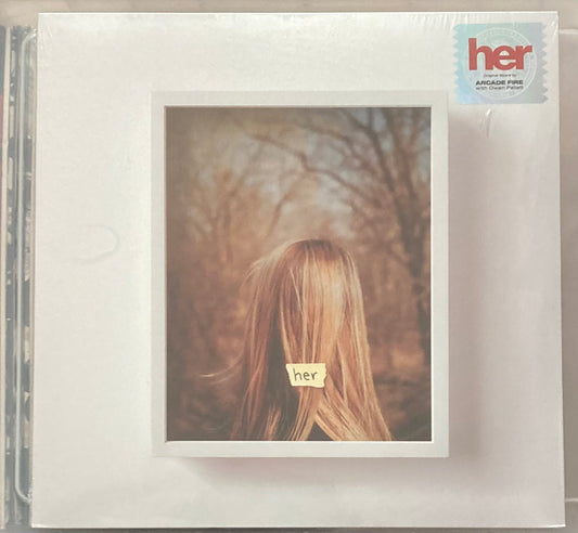 The front of 'Arcade Fire - Her' on vinyl