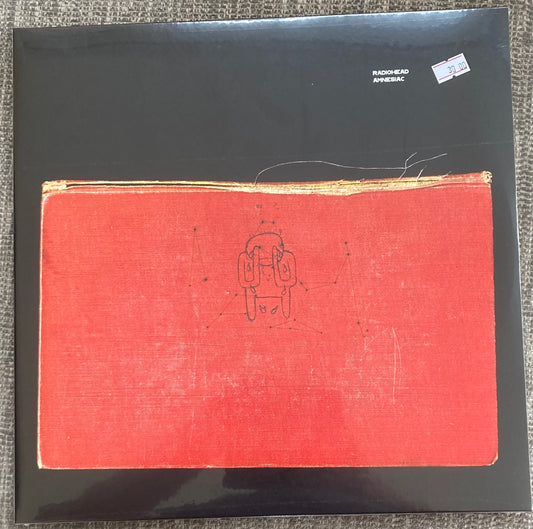 The front of 'Radiohead - Amnesiac' on vinyl. It is sealed and unplayed