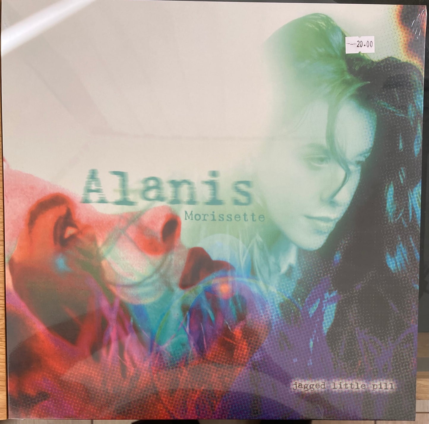 The front of 'Alanis Morissette Jagged Little Pill' on vinyl