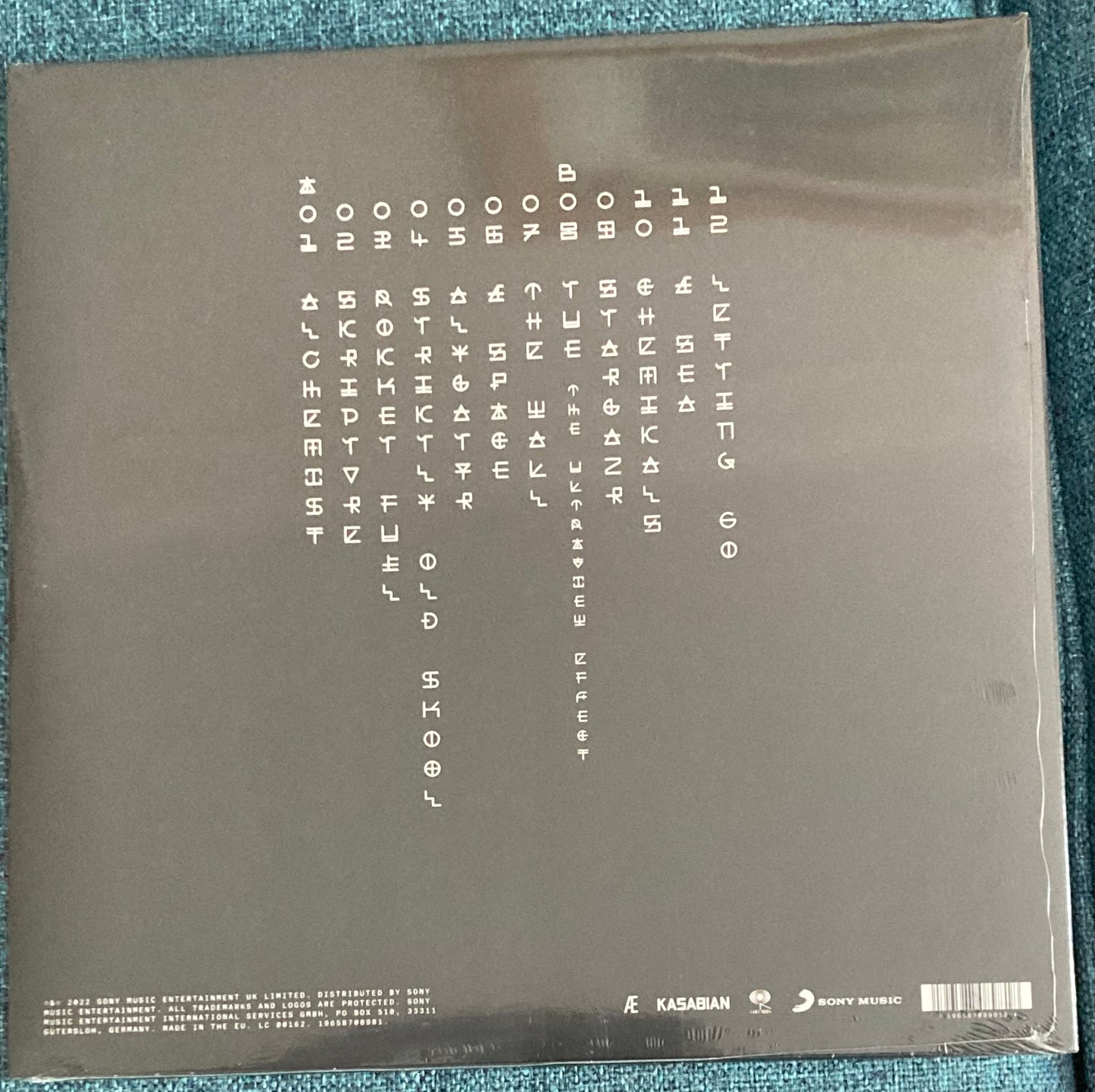 The back of 'Kasabian The Alchemist’s Euphoria' on vinyl