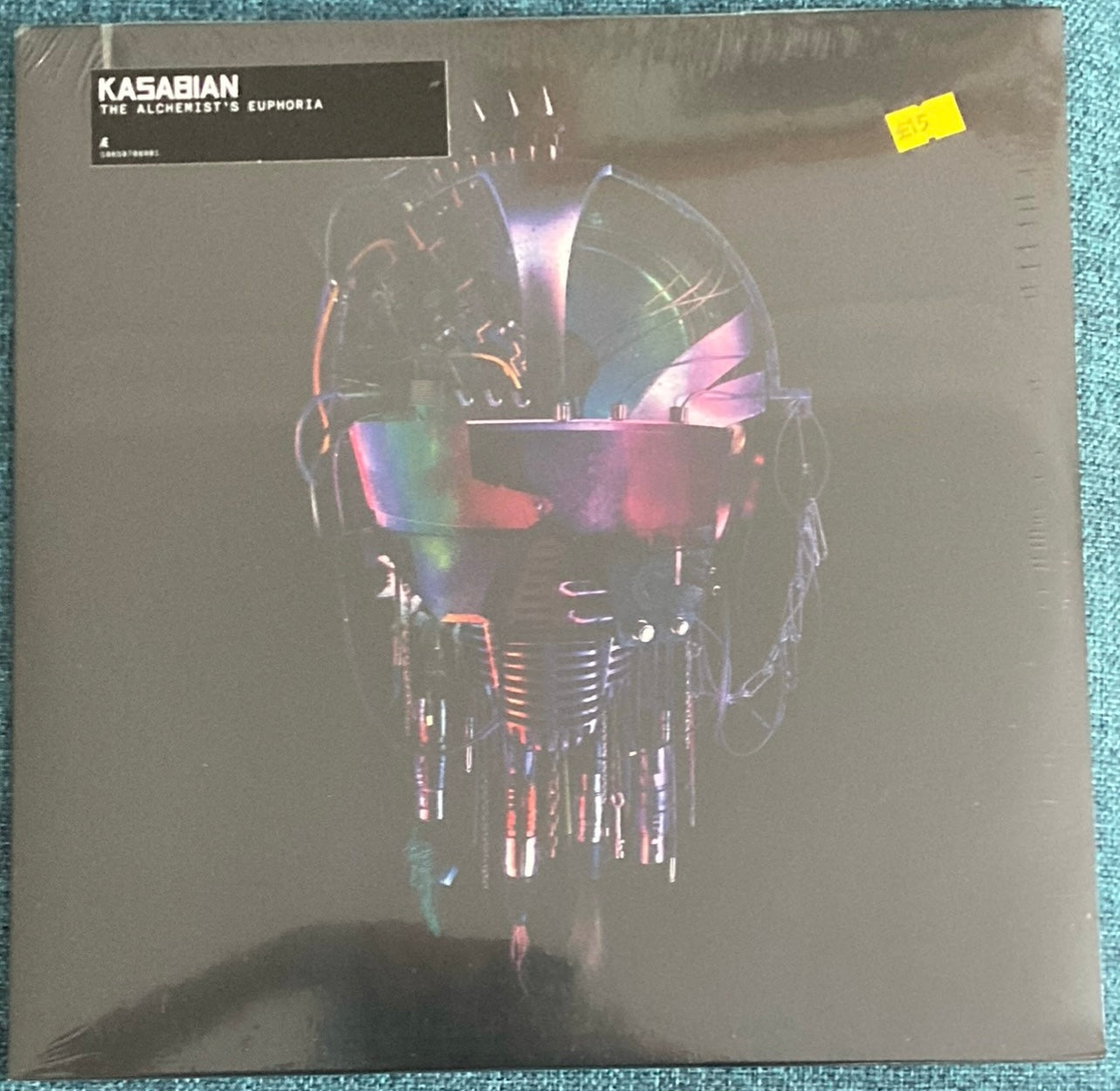 The front of 'Kasabian The Alchemist’s Euphoria' on vinyl