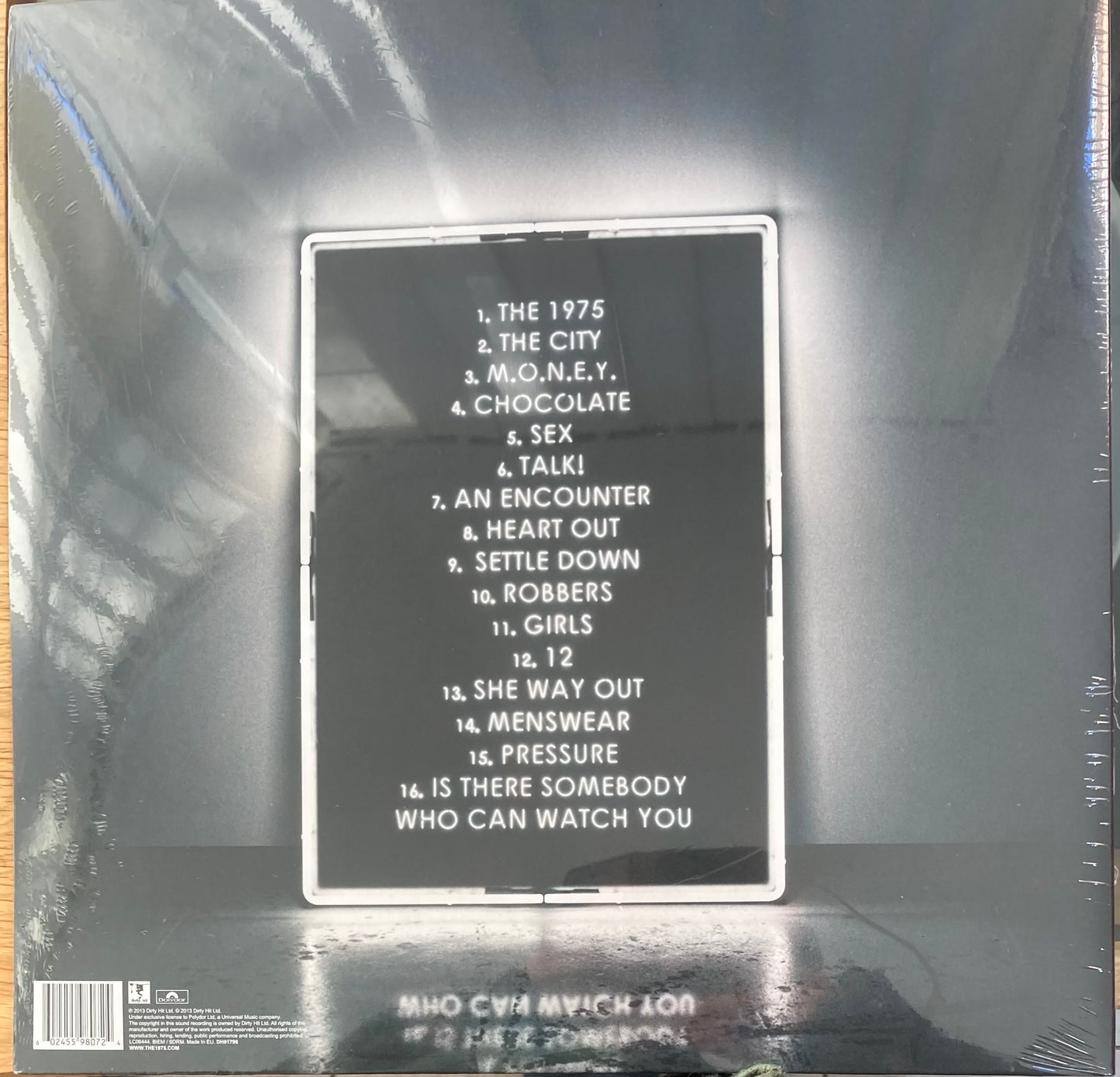 The back of ' The 1975 self-titled debut record' on vinyl