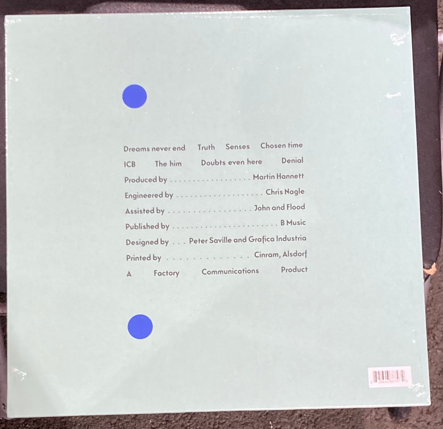 The back of 'New Order - Movement' on vinyl