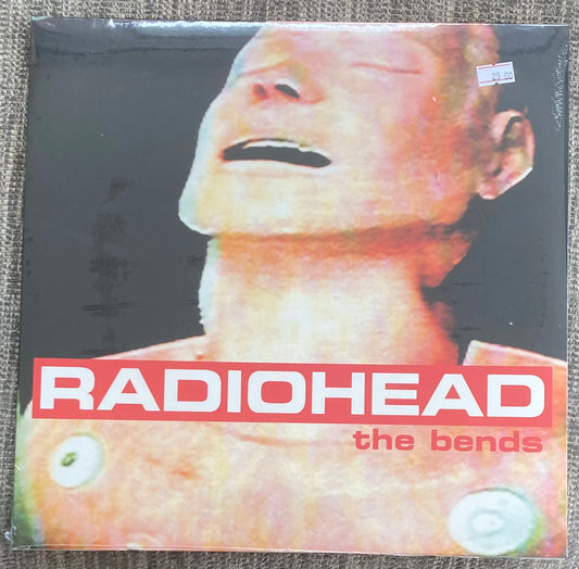 The front of 'Radiohead - The Bends' on vinyl. It is brand new and sealed.
