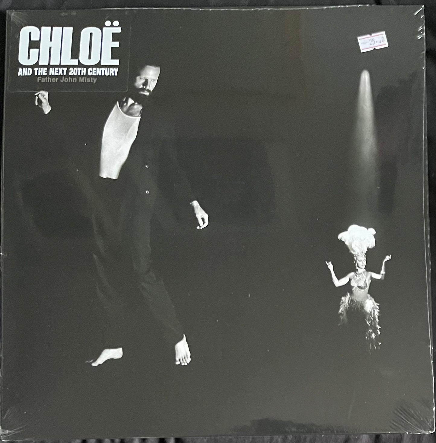 Vinyl record cover with black and white images of a man and a woman, featuring the text 'Chloe and the Next 20th Century' by Father John Misty.