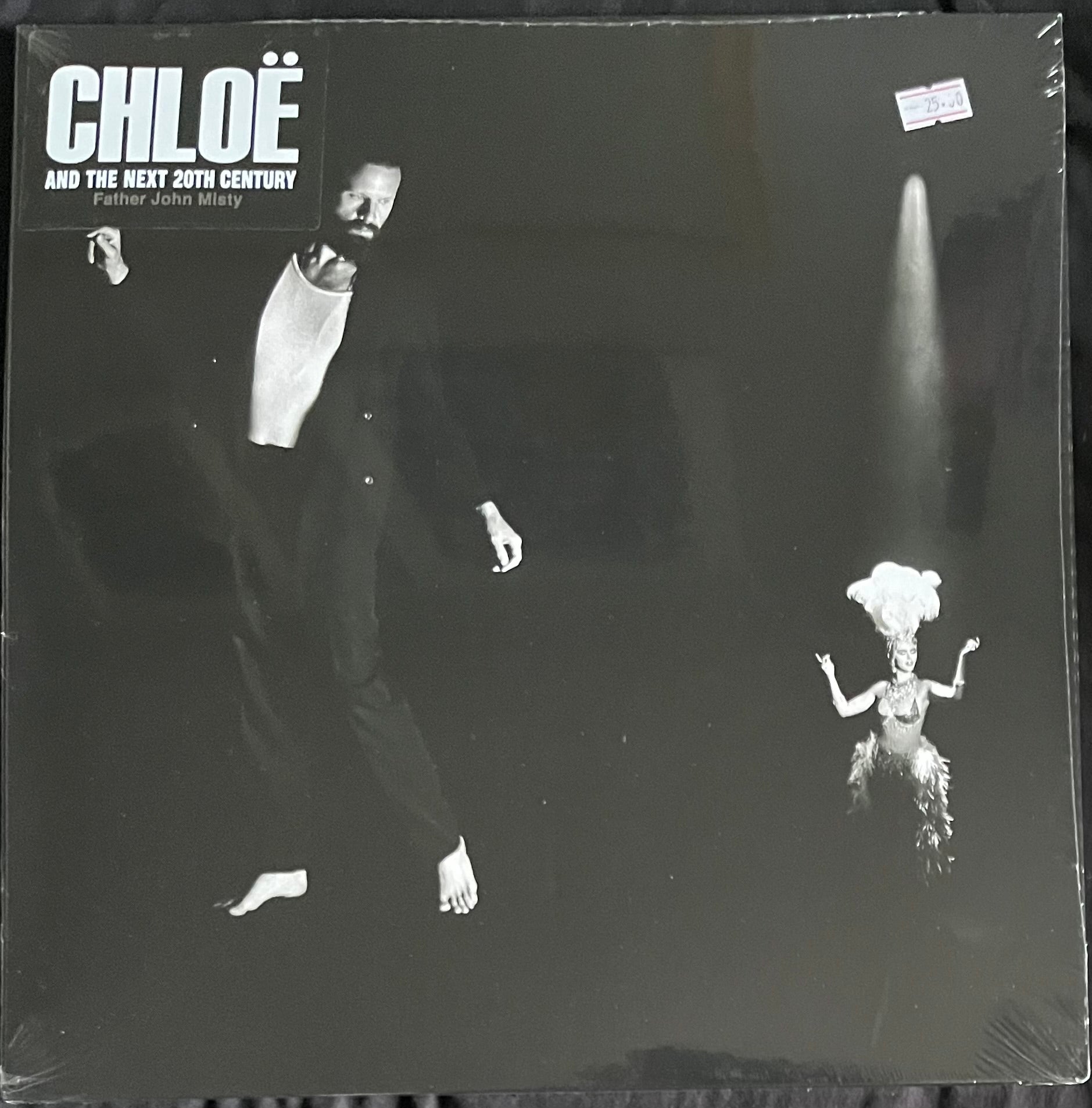 Vinyl record cover with black and white images of a man and a woman, featuring the text 'Chloe and the Next 20th Century' by Father John Misty.