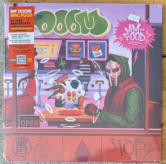 The front of ‘MF DOOM - Mm… Food’ on vinyl
