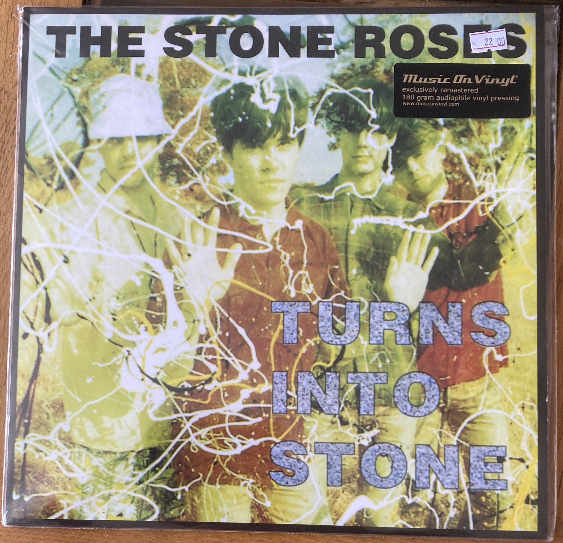 The front of 'The Stone Roses - Turns into Stone' on vinyl