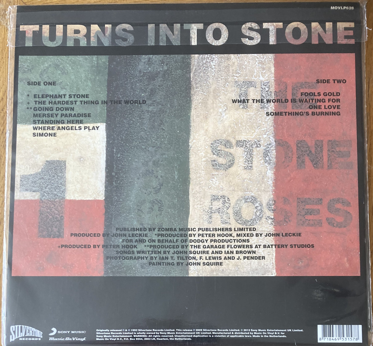 The back of 'The Stone Roses - Turns into Stone' on vinyl