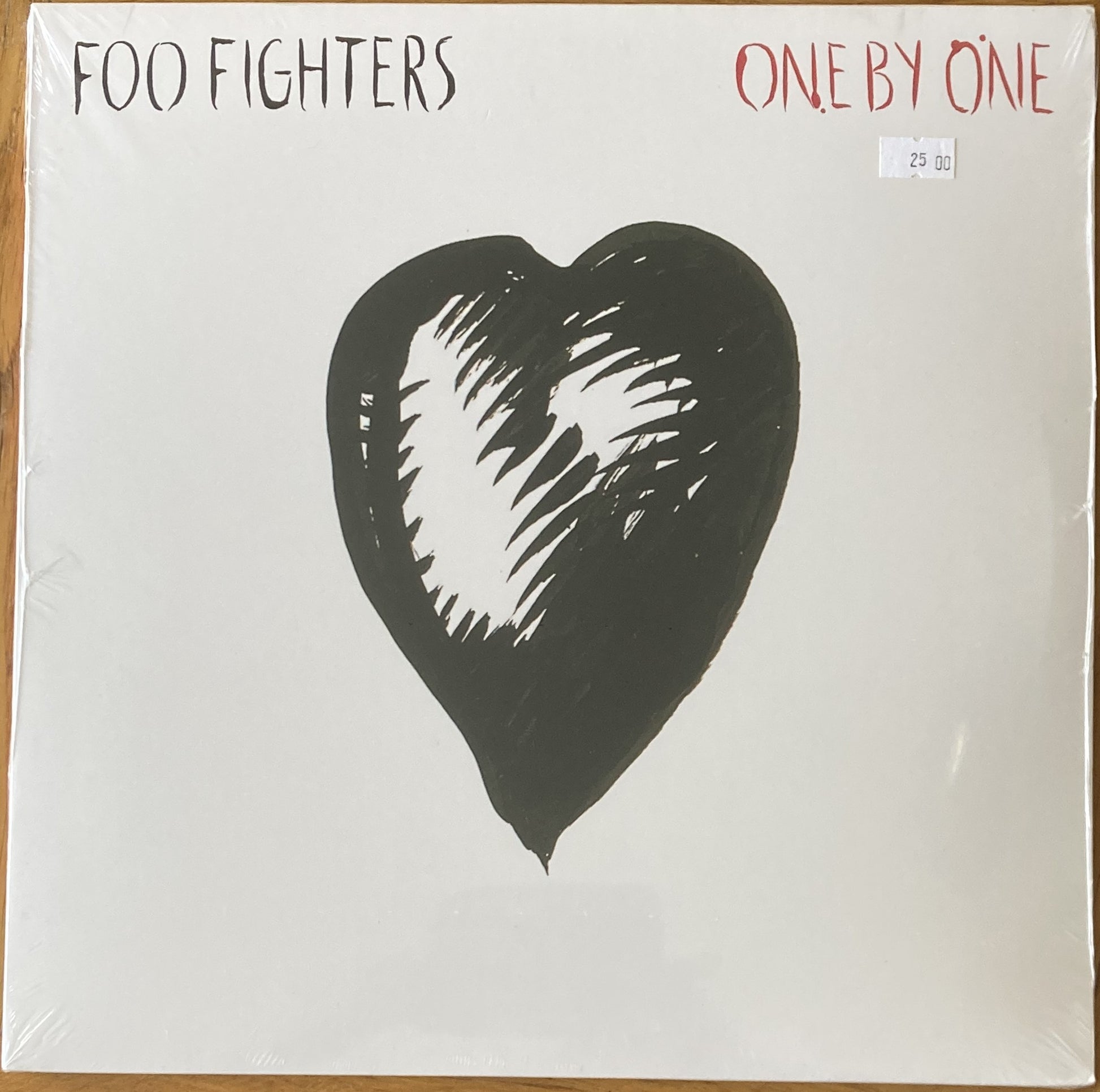 The front of 'Foo Fighters - One by One' on vinyl