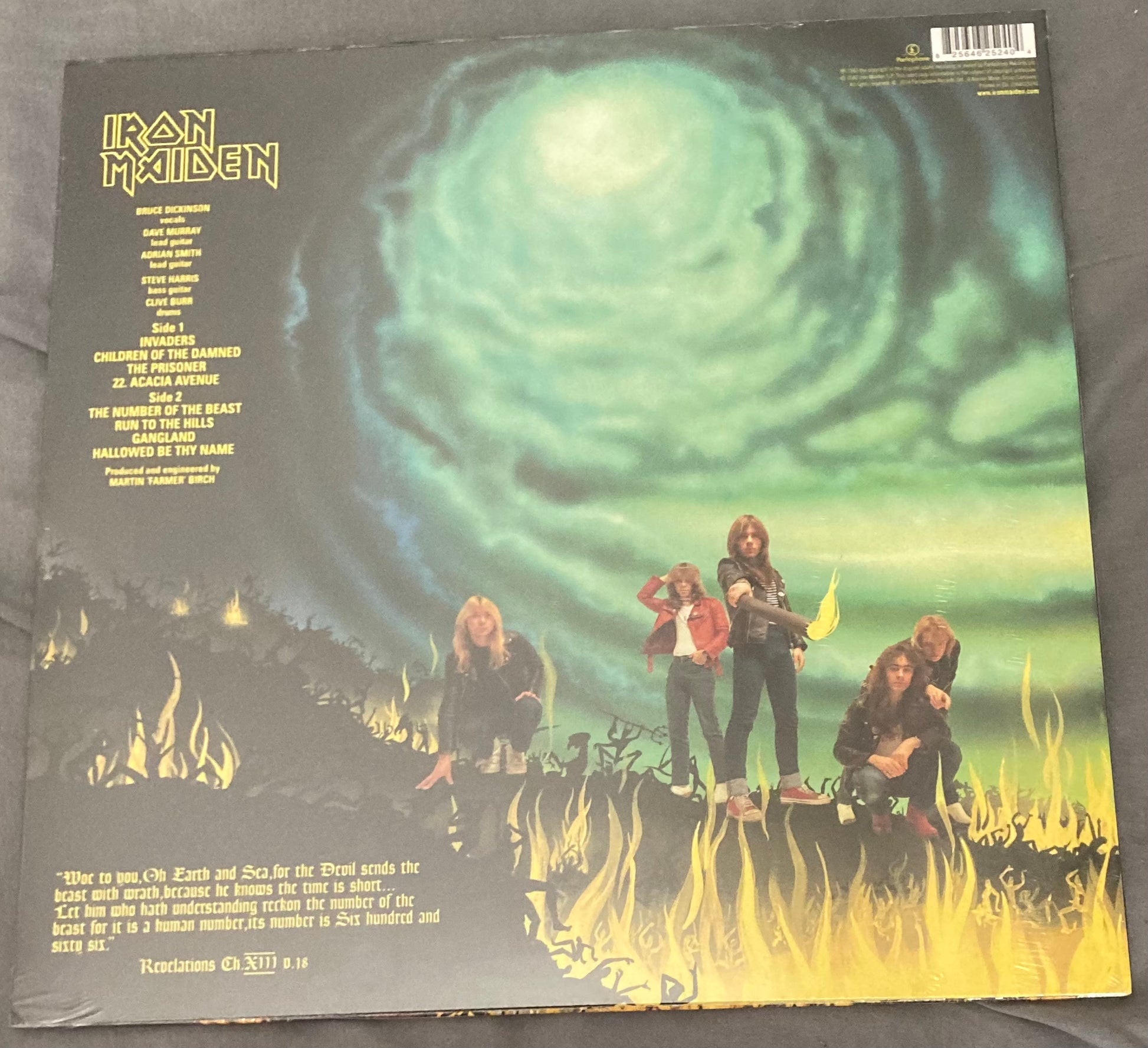 The back of the 'Iron Maiden Number of the Beast' sleeve, featuring song titles and credits.