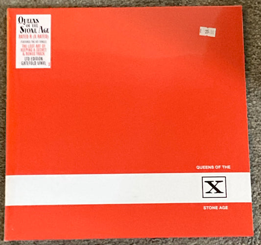 The front of 'Queens of the Stone Age - Rated R (Rated X)' on vinyl