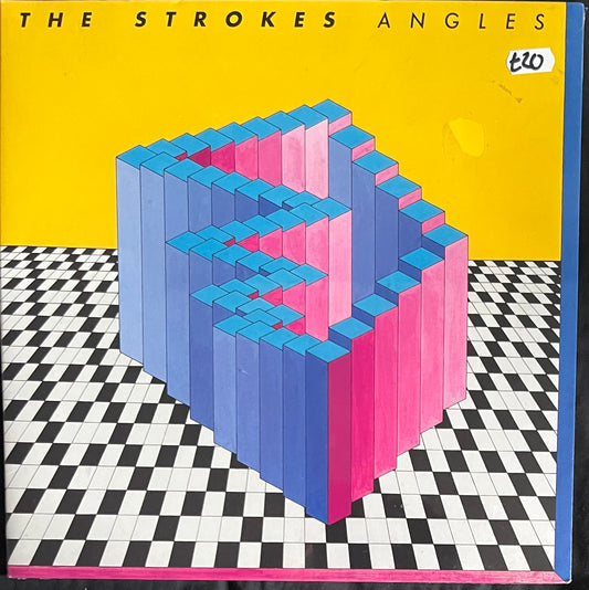 Album cover for 'Angles' by The Strokes with geometric design and checkered floor.