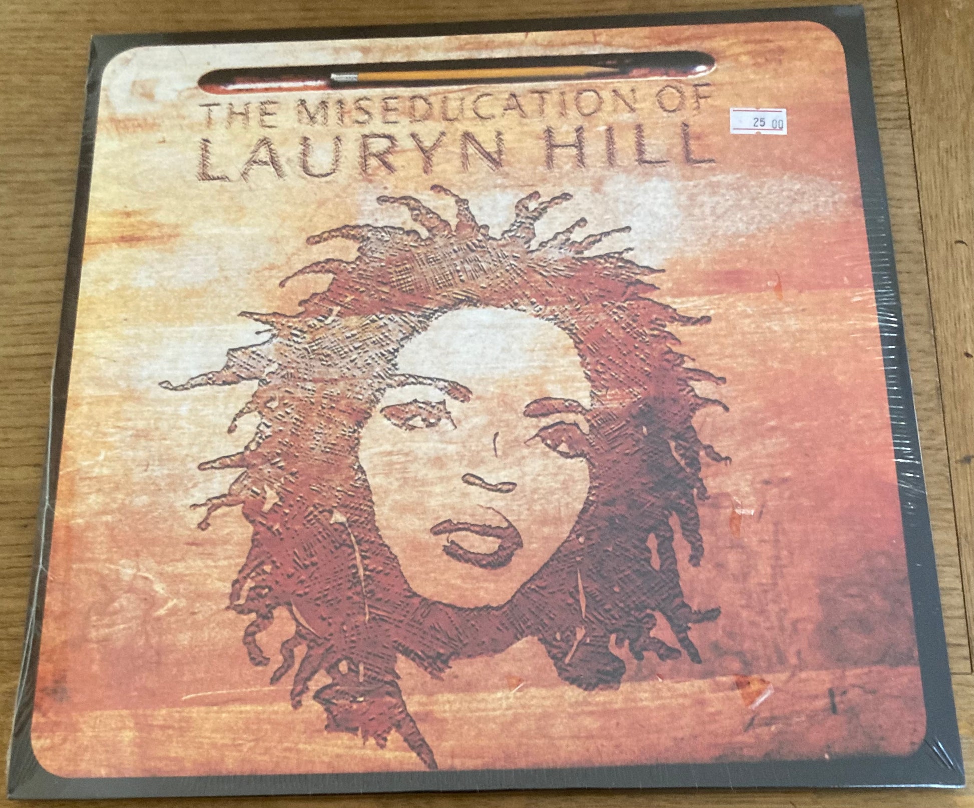 The front of 'The Miseducation of Lauryn Hill' on vinyl