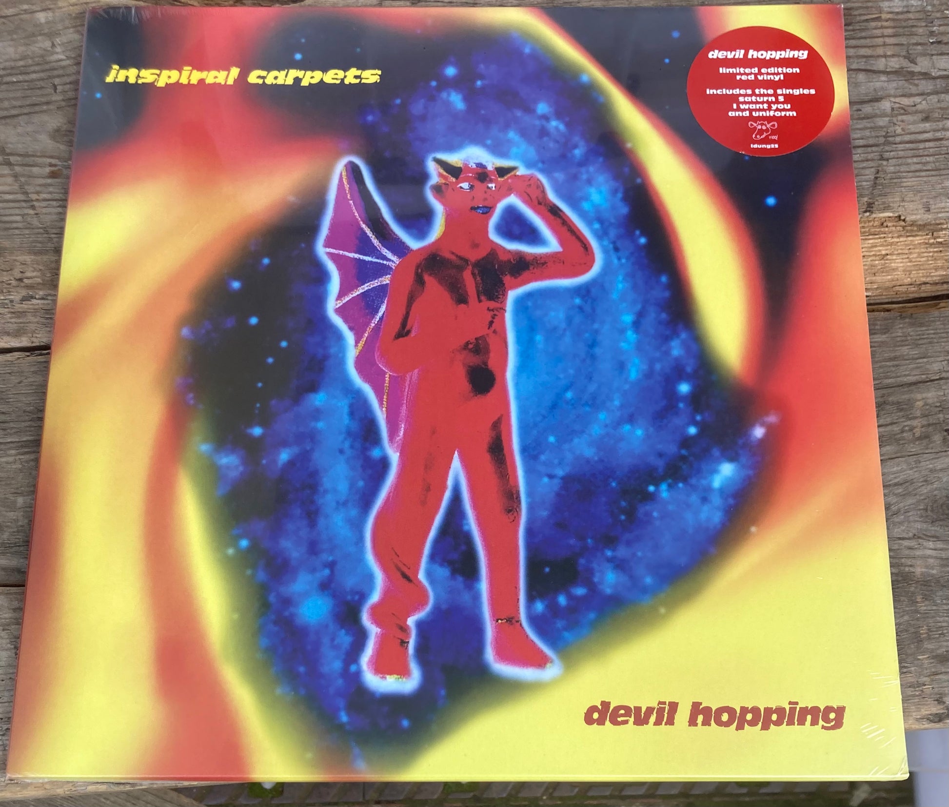 The front of 'Inspiral Carpets - Devil Hopping' on vinyl