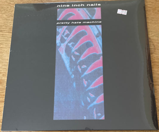 The front of 'Nine Inch Nails - Pretty Hate Machine' on vinyl