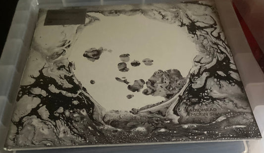 The front of 'Radiohead - A Moon Shaped Pool' on vinyl
