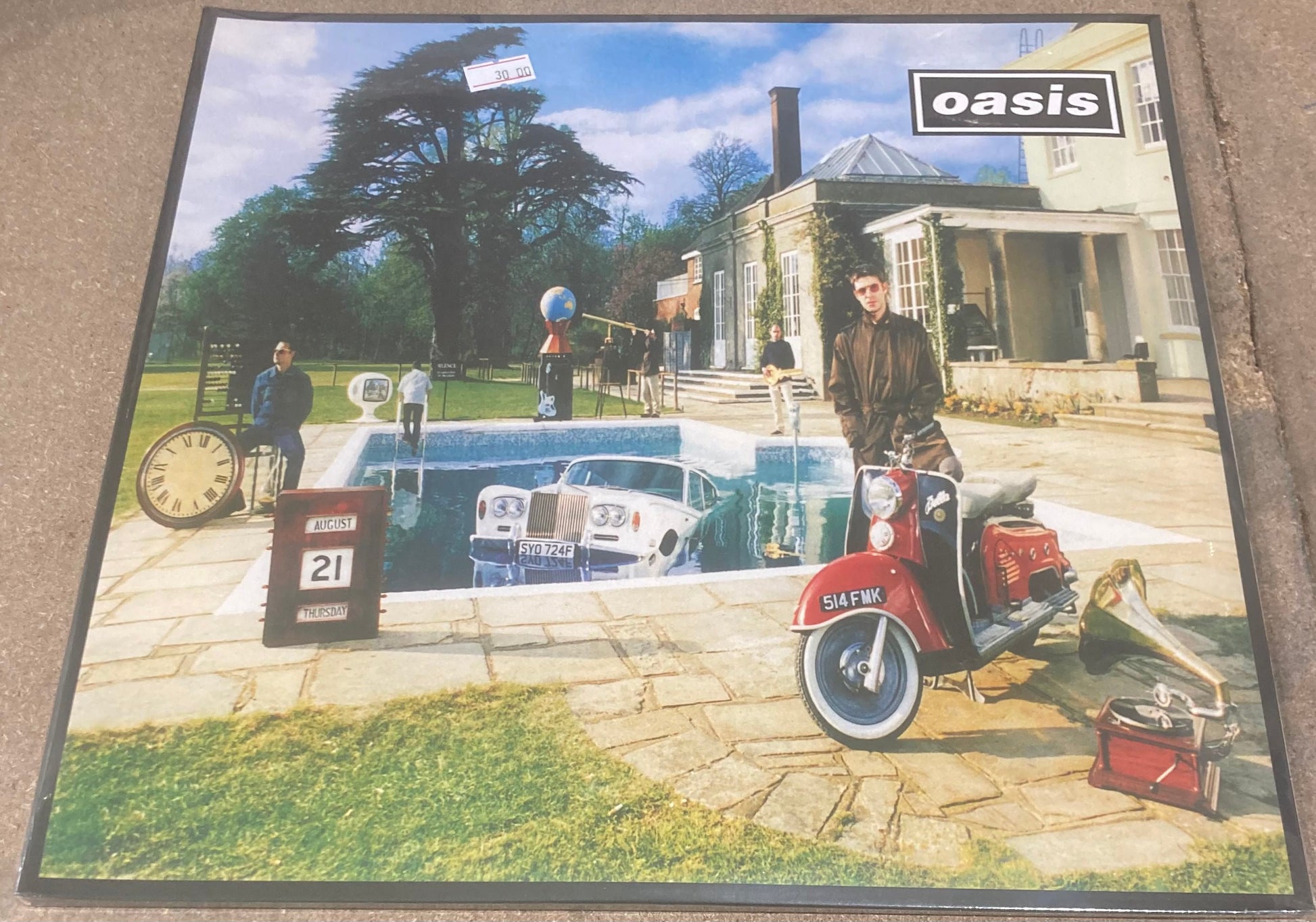 The front of ‘Oasis - Be Here Now’ on vinyl