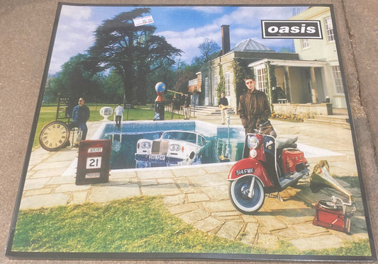 The front of ‘Oasis - Be Here Now’ on vinyl