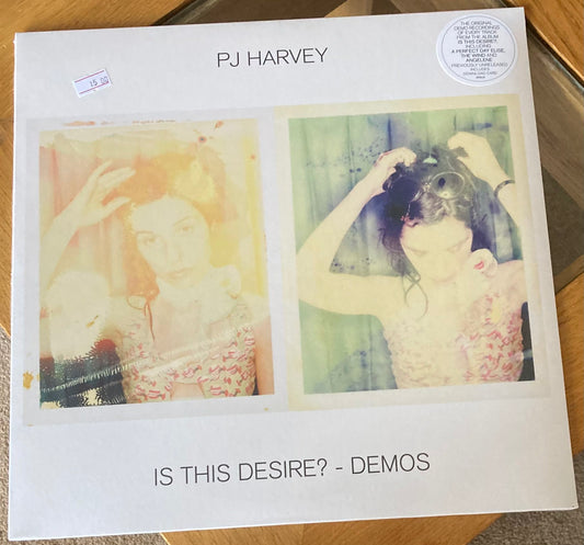 The front of 'PJ Harvey - Is This Desire?' on vinyl