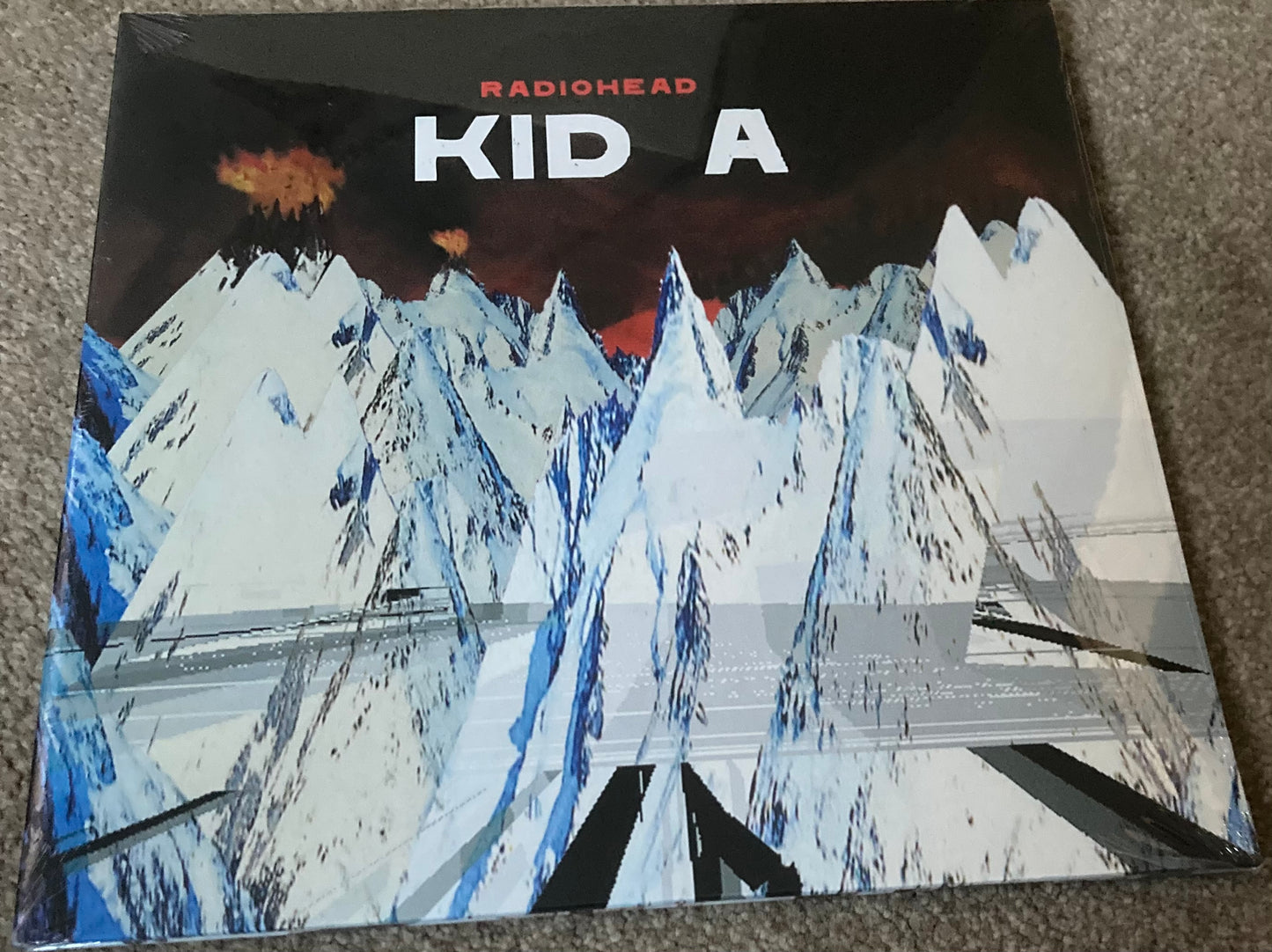 The front of Radiohead - Kid A on vinyl