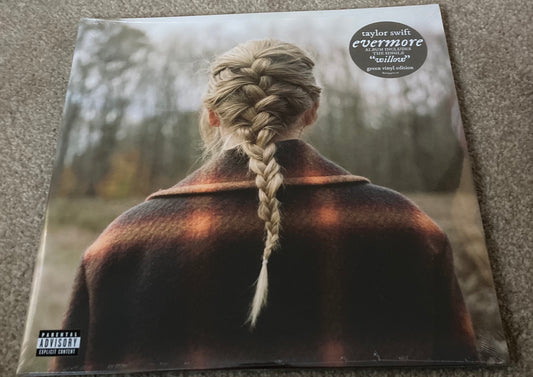 The front of 'Taylor Swift - Evermore' on vinyl