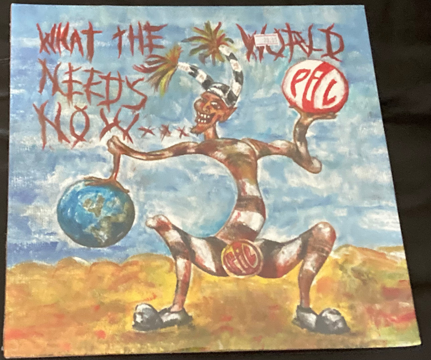 The front of 'Public Image Ltd - What the World Needs Now' on vinyl