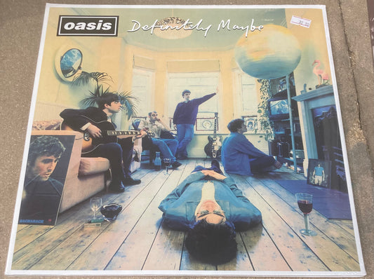 The front of ‘Oasis - Definitely Maybe’ on vinyl