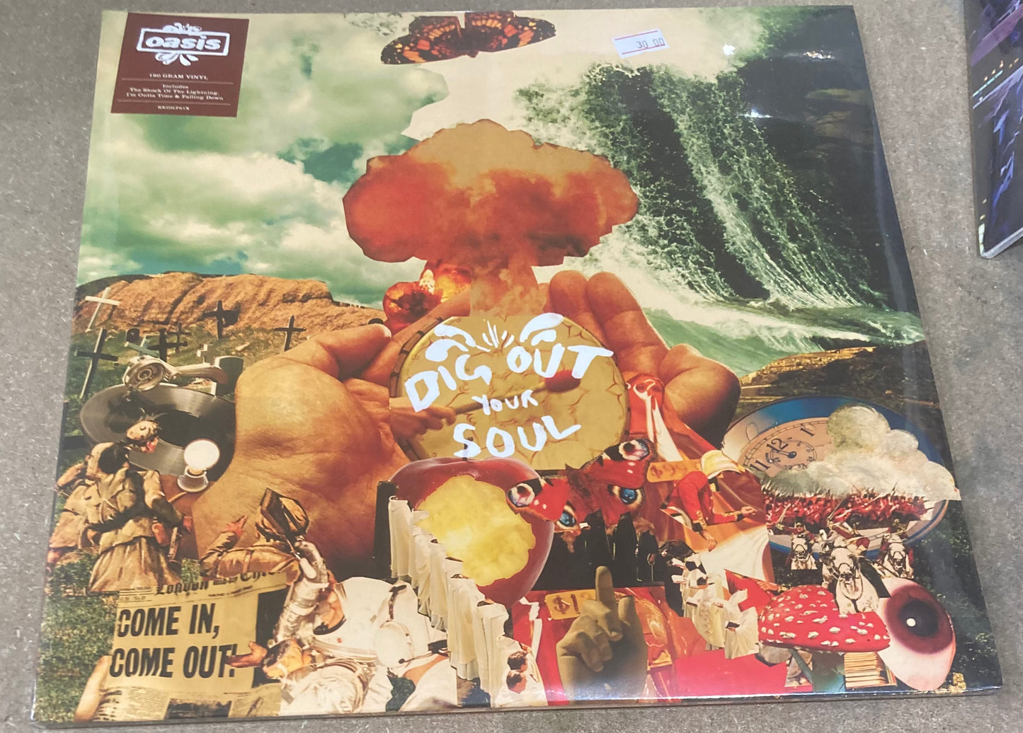 The front of ‘Oasis - Dig Out Your Soul’ on vinyl
