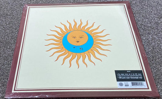The front of ‘King Crimson - Lark’s Tongues in Aspic’ on vinyl.