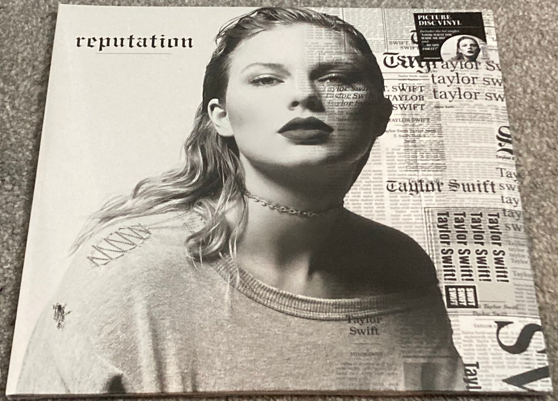 The front of Taylor Swift - Reputation on vinyl